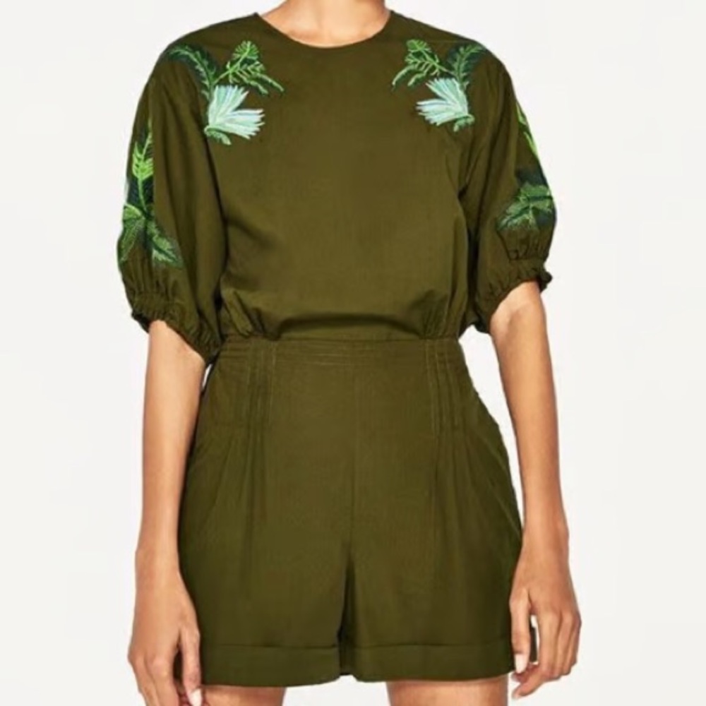 Olive green embroidered romper with tie waist, puff short sleeves and open back